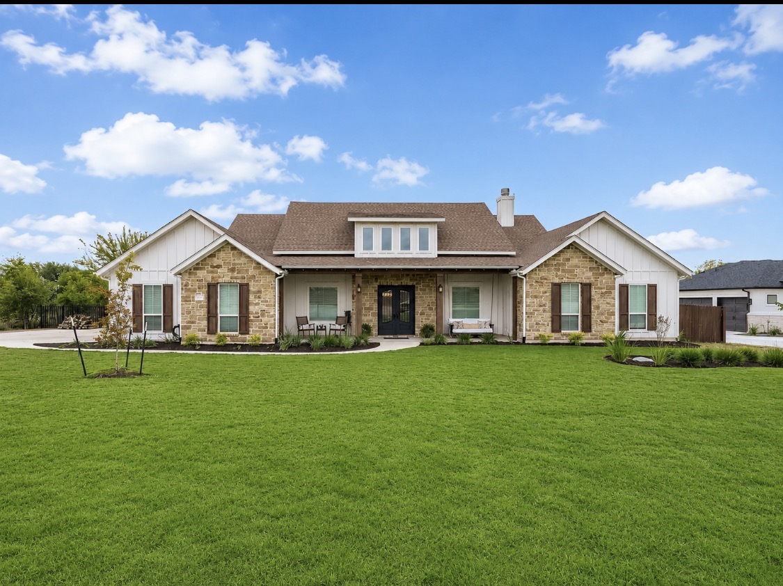 132 Huerta Road Florence, TX 76527 - Photo 1 of 38 a front view of house with yard and green space