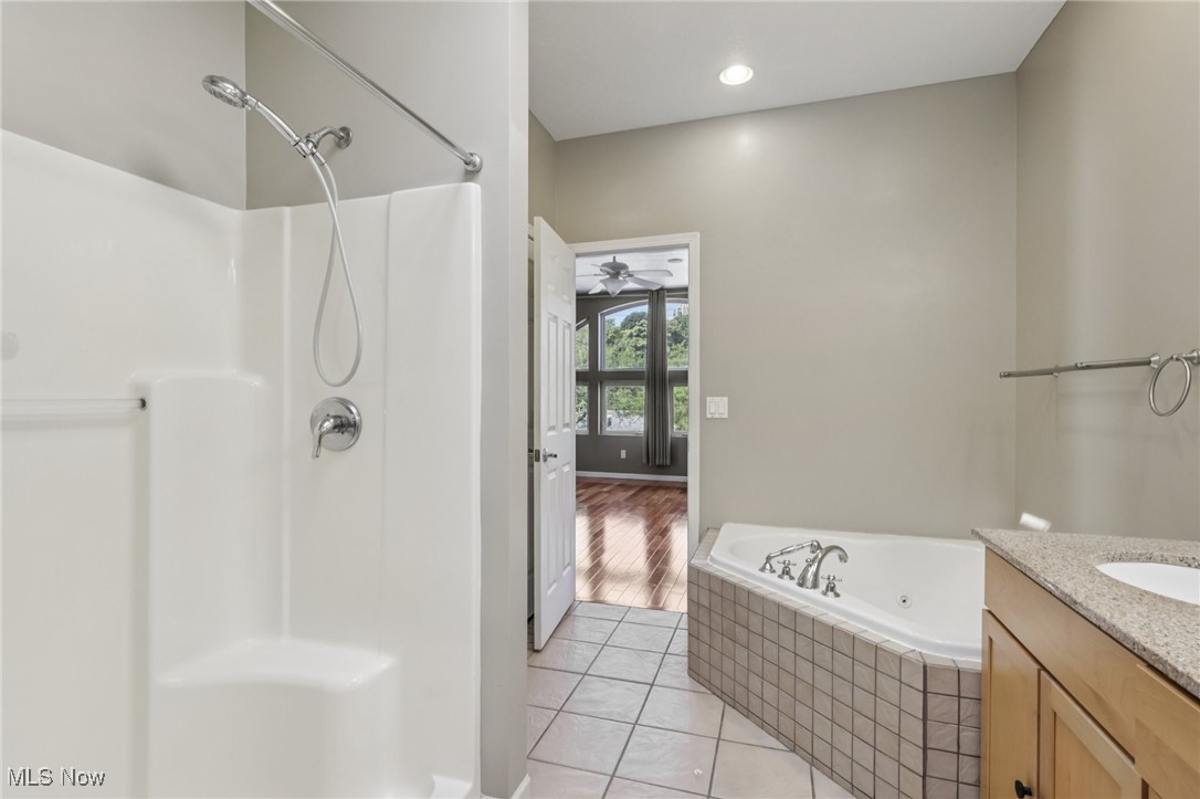1951 Columbus Road Cleveland, OH 44113 - Photo 27 of 46 Ensuite bathroom in main bedroom including a soaking tub and shower