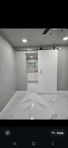 a bathroom with a toilet and a vanity