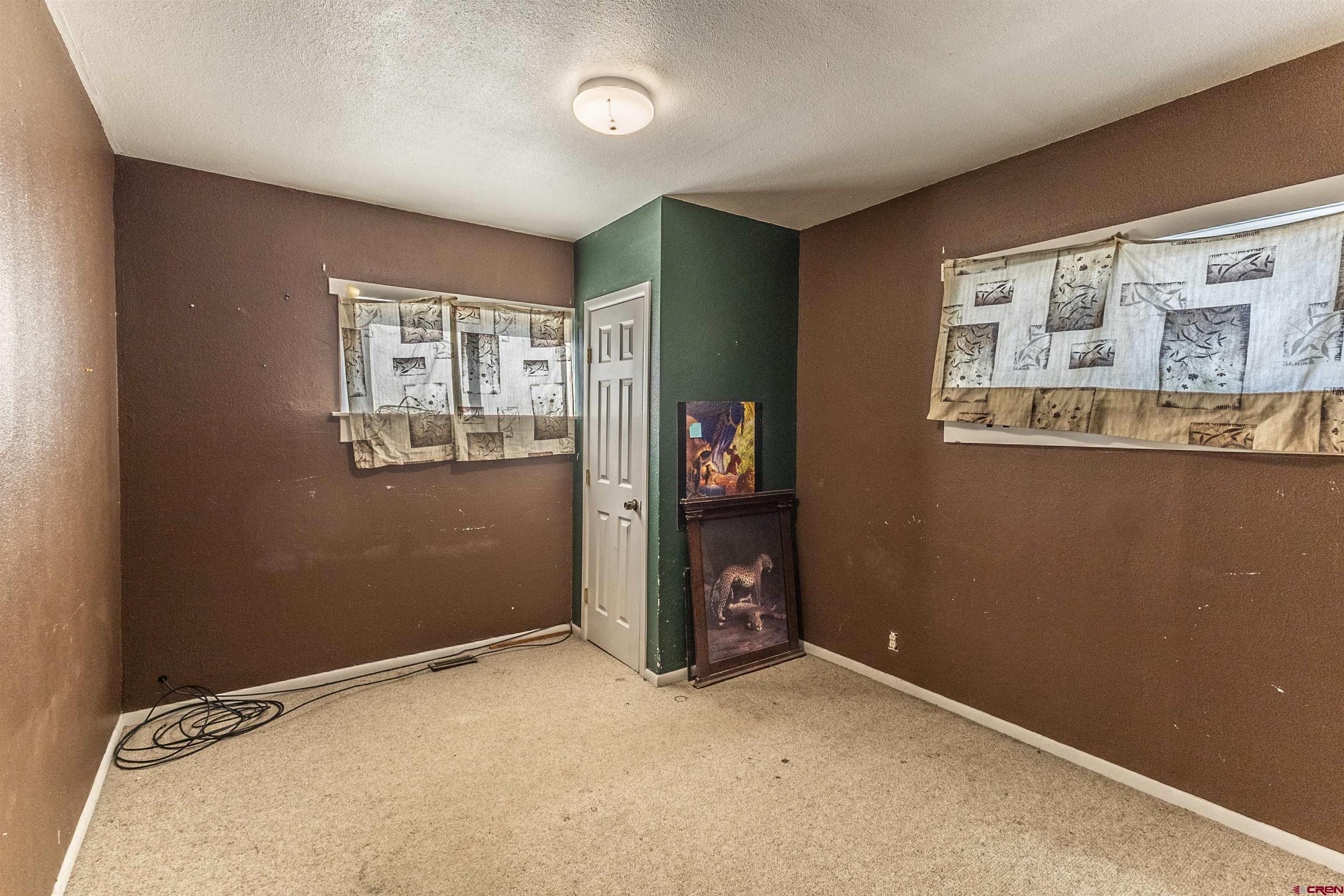 11 Road 3003 Aztec, NM 87410 - Photo 20 of 38 an empty room with windows