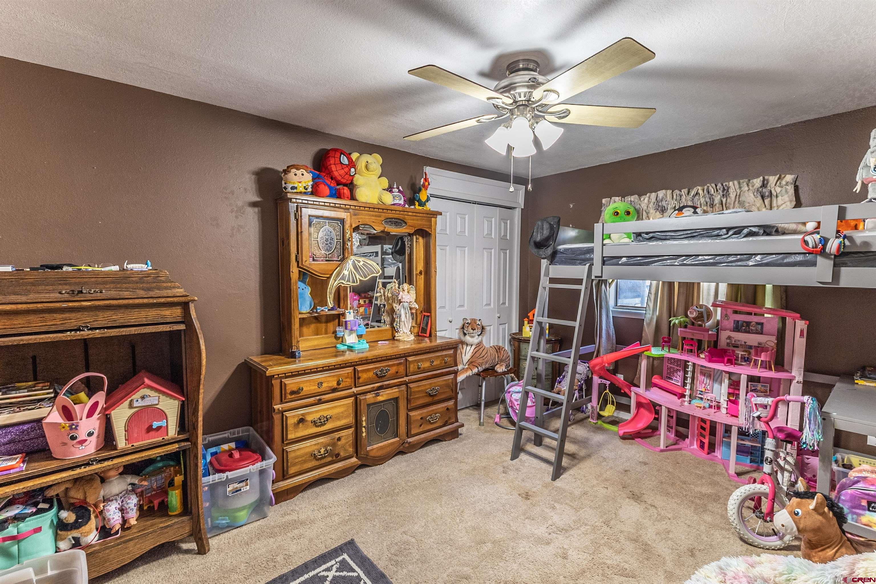 11 Road 3003 Aztec, NM 87410 - Photo 24 of 38 a living room with lots of furniture and white walls