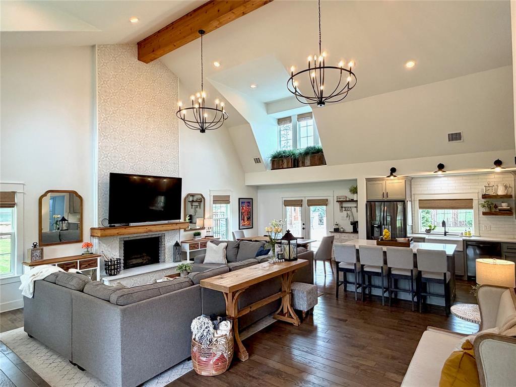 1304 Tinker Road Colleyville, TX 76034 - Photo 6 of 28 a living room with fireplace furniture and a flat screen tv
