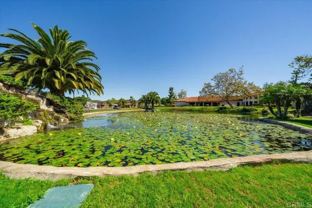 an aerial view of a house with outdoor space