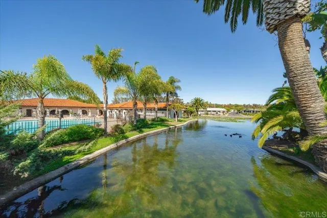 a view of outdoor space and swimming pool