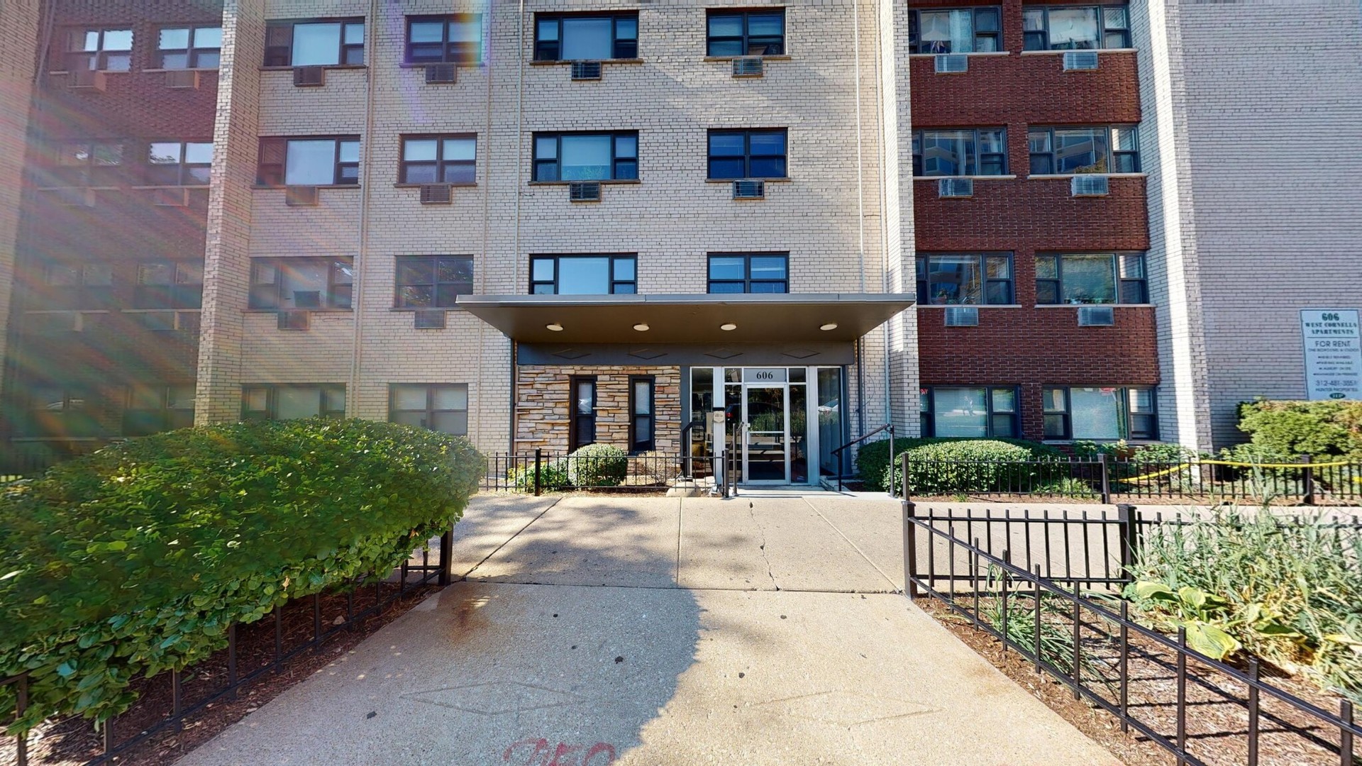 606 West Cornelia Avenue, Unit 482 Chicago, IL 60657 - Photo 13 of 13 a view of a building with a yard
