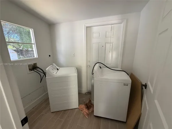 a room with water heater and window