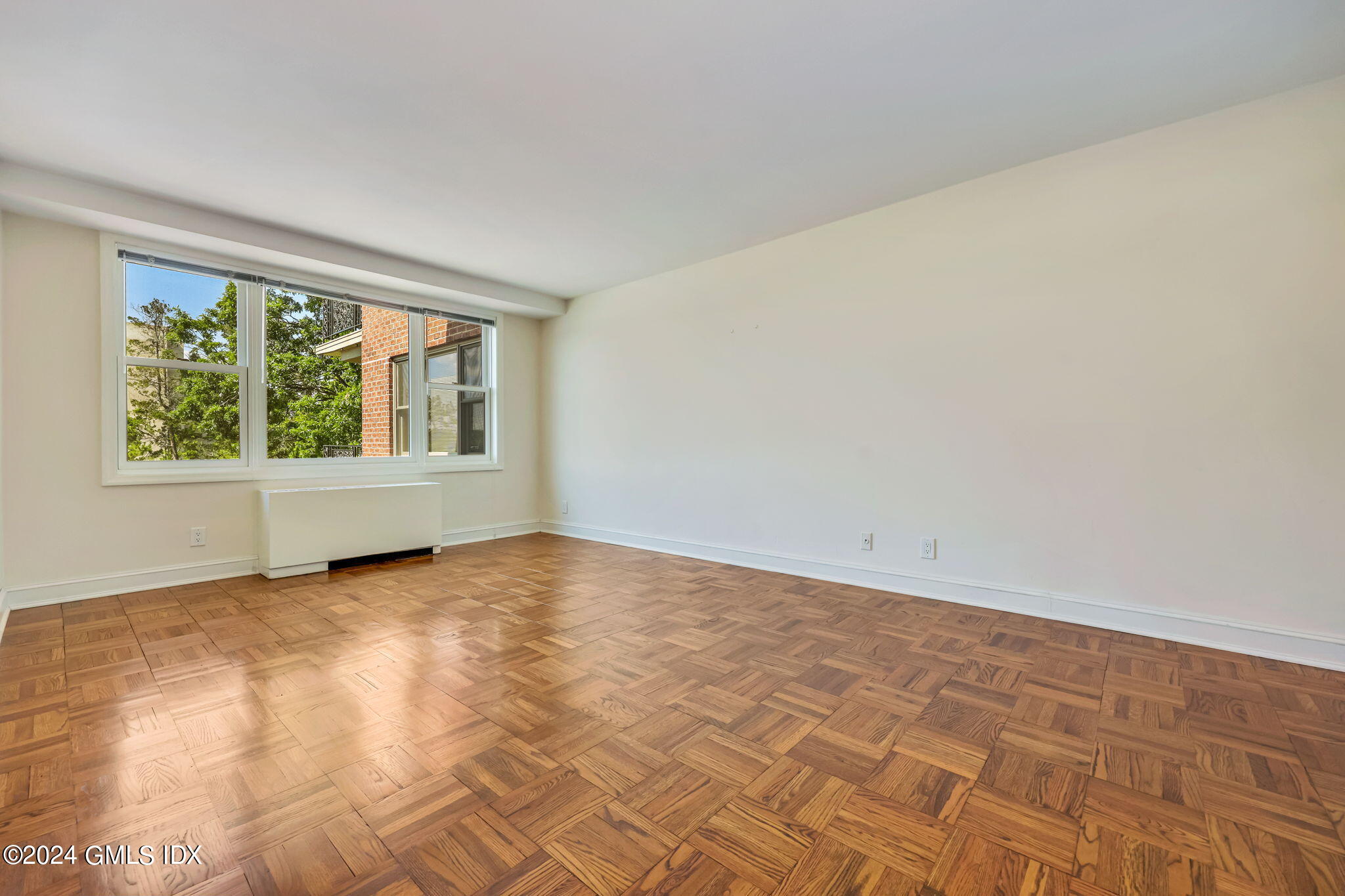 630 Steamboat Road, Unit 3CN Greenwich, CT 06830 - Photo 13 of 19 a view of an empty room with a window