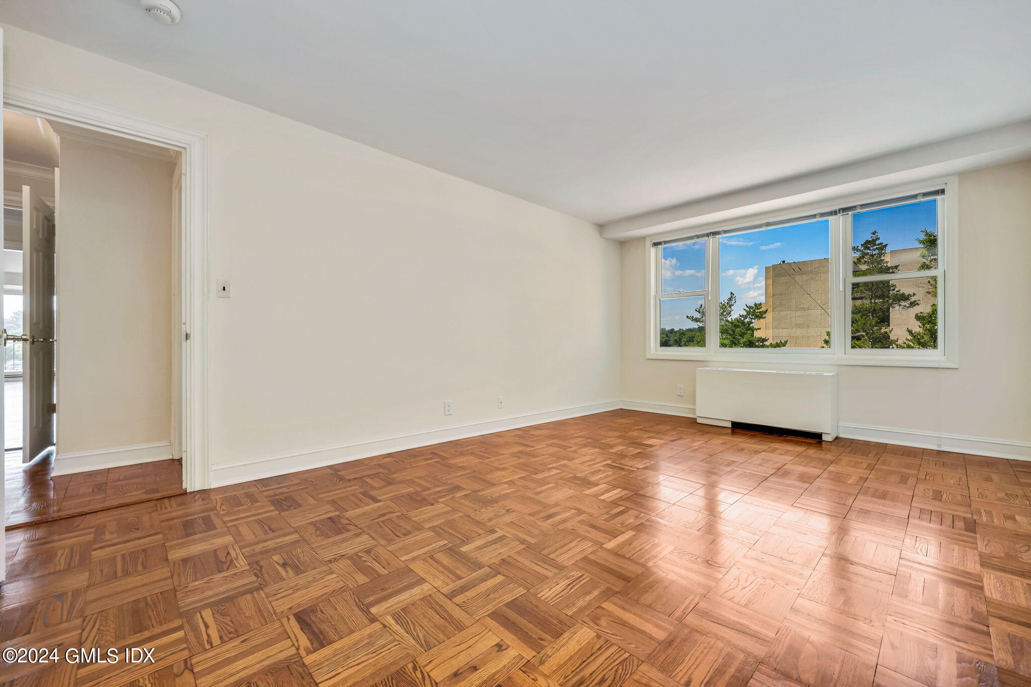 630 Steamboat Road, Unit 3CN Greenwich, CT 06830 - Photo 14 of 19 a view of an empty room with a window