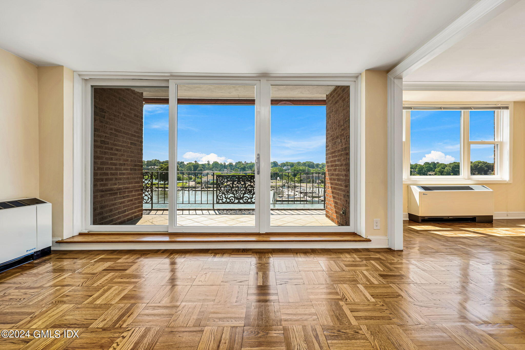 630 Steamboat Road, Unit 3CN Greenwich, CT 06830 - Photo 6 of 19 a view of a living room and hardwood floor