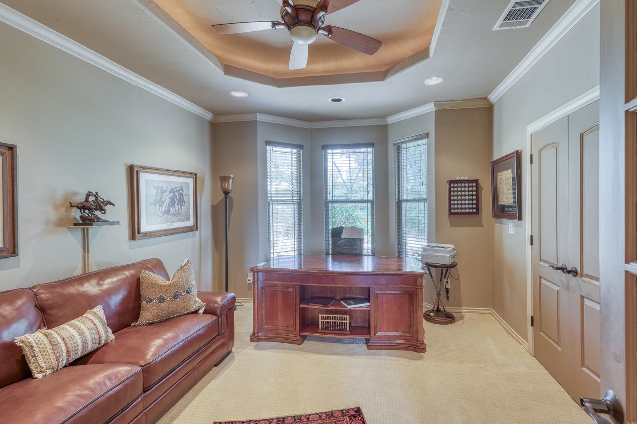 1612 Swear Injun Horseshoe Bay, TX 78657 - Photo 14 of 30 a living room with furniture and a window
