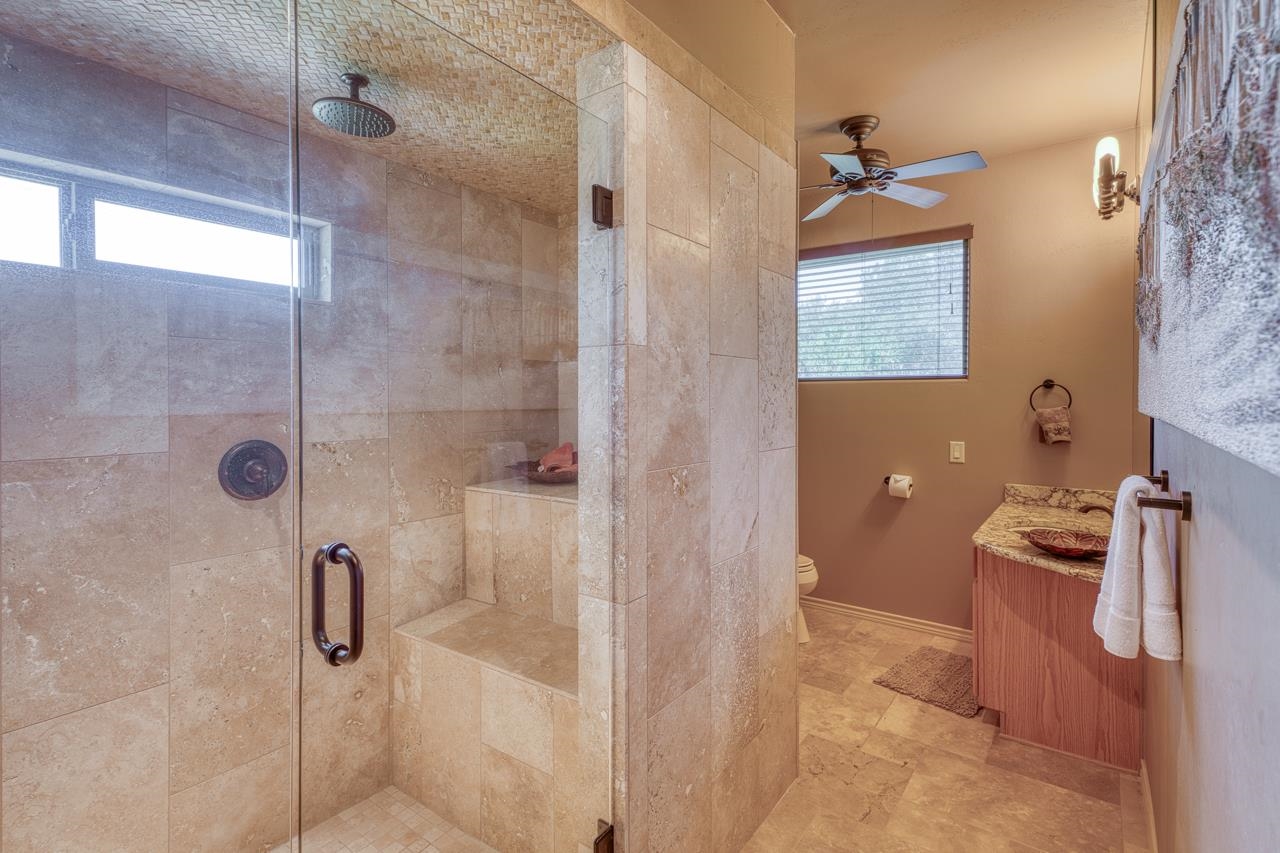 1612 Swear Injun Horseshoe Bay, TX 78657 - Photo 21 of 30 a bathroom with a shower
