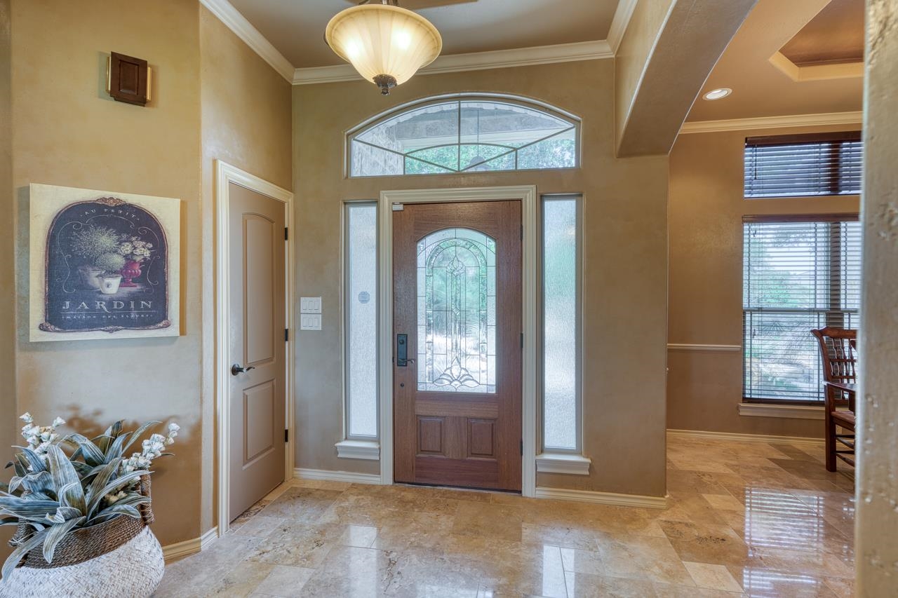 1612 Swear Injun Horseshoe Bay, TX 78657 - Photo 5 of 30 a view of a livingroom with furniture and window