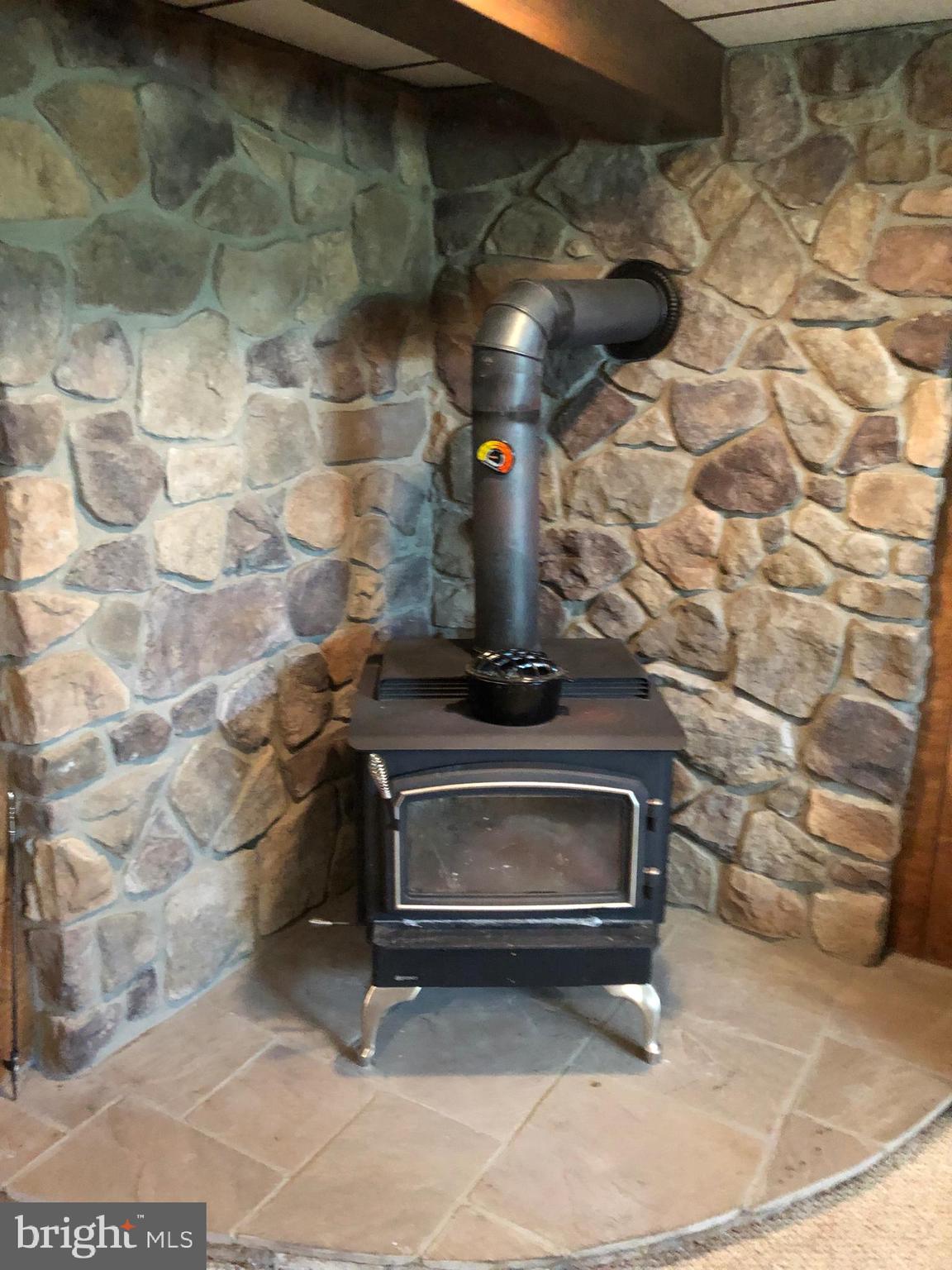 5390 Altenwald Road Waynesboro, PA 17268 - Photo 27 of 37 Family room wood stove