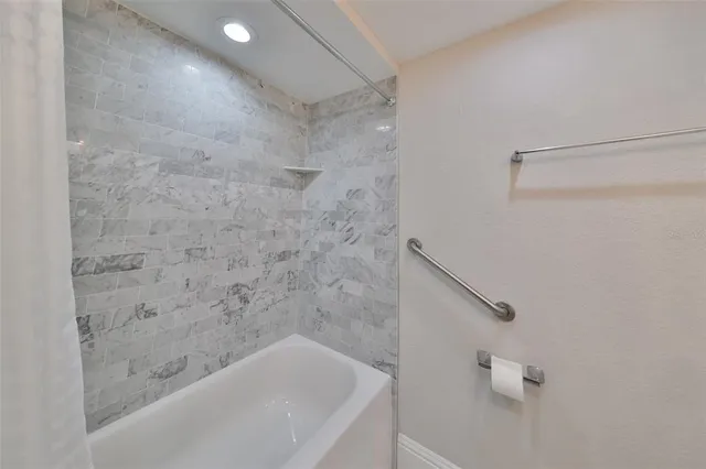 a bathroom with a bathtub