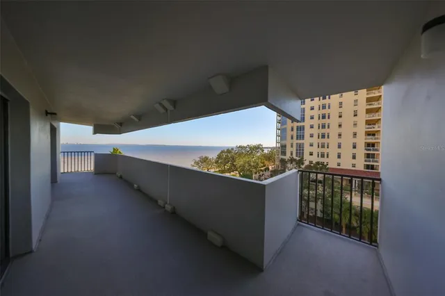 a balcony with an outdoor space