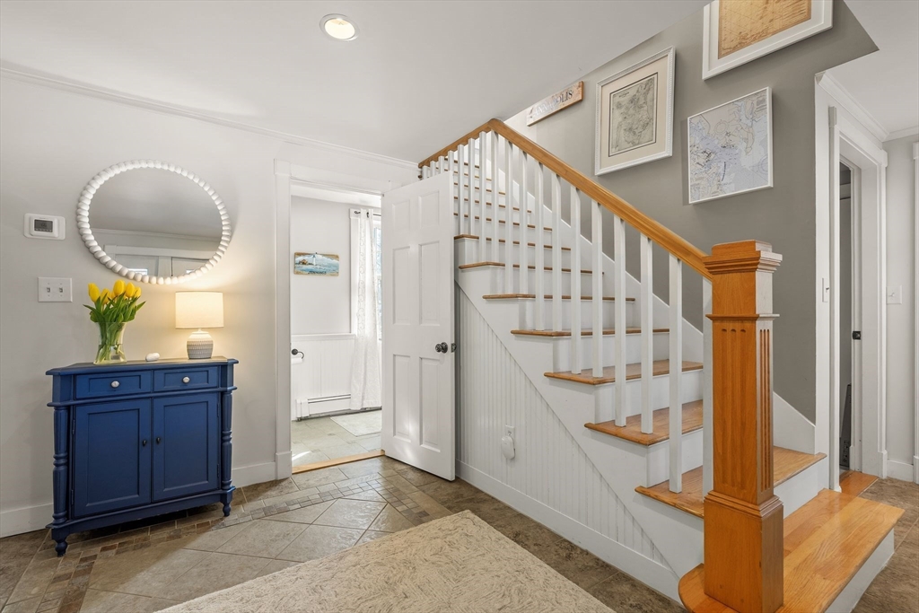 20 Lawson Road Scituate, MA 02066 - Photo 3 of 37 a view of entryway and hall with wooden floor
