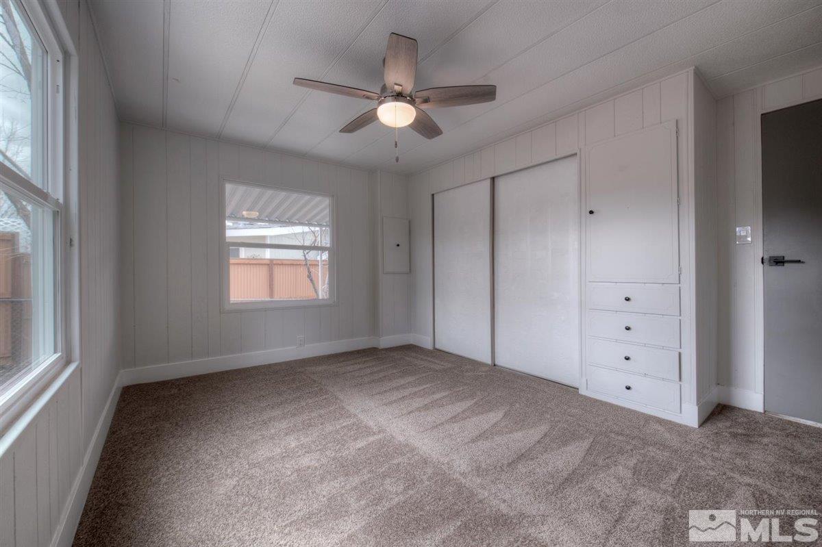 180 Chlorite Court Reno, NV 89521 - Photo 14 of 33 a view of an empty room with a window