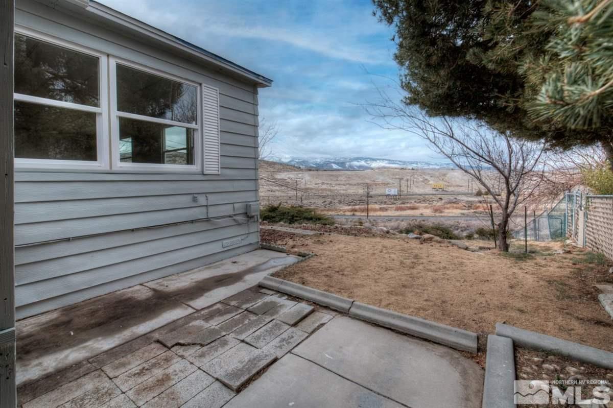 180 Chlorite Court Reno, NV 89521 - Photo 23 of 33 a view of a backyard of the house