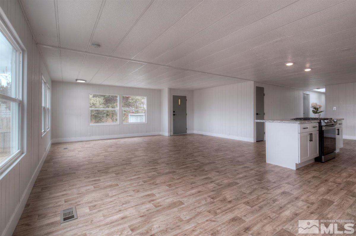 180 Chlorite Court Reno, NV 89521 - Photo 7 of 33 a view of an empty room with a window