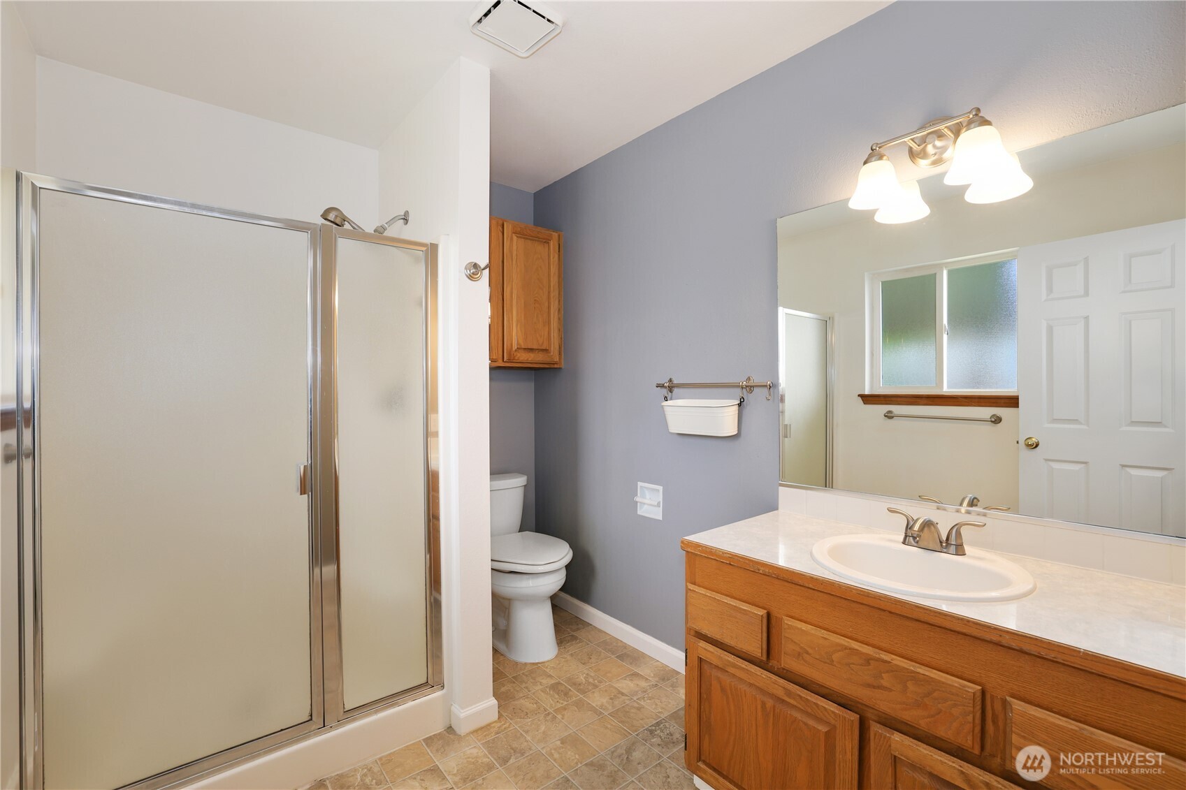 2947 Edel Avenue Enumclaw, WA 98022 - Photo 15 of 35 a bathroom with a sink a toilet and a mirror