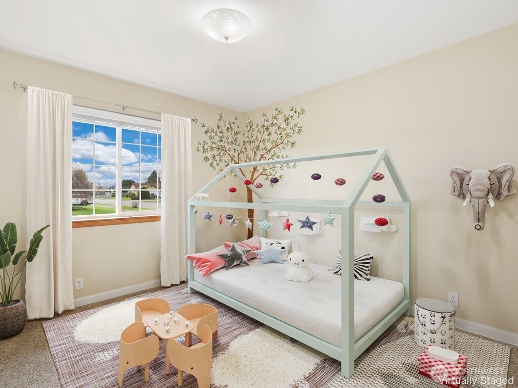 2947 Edel Avenue Enumclaw, WA 98022 - Photo 16 of 35 a bedroom with a bed and a window