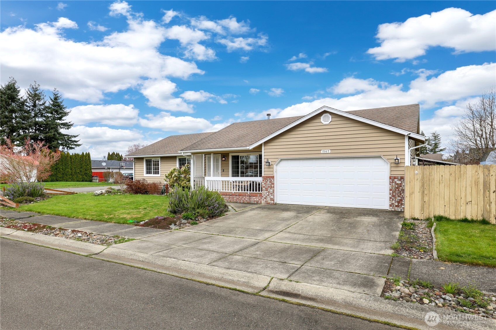 2947 Edel Avenue Enumclaw, WA 98022 - Photo 2 of 35 a view of backyard of house and car parked