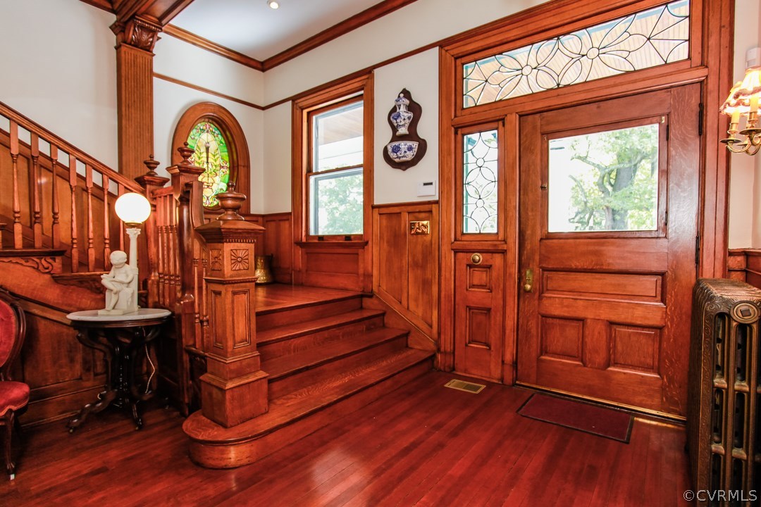 4016 Hermitage Road Richmond, VA 23227 - Photo 2 of 24 a view of entryway with a hardwood floor and a fireplace