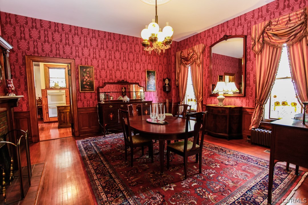 4016 Hermitage Road Richmond, VA 23227 - Photo 7 of 24 a view of a dining room with furniture and chandelier