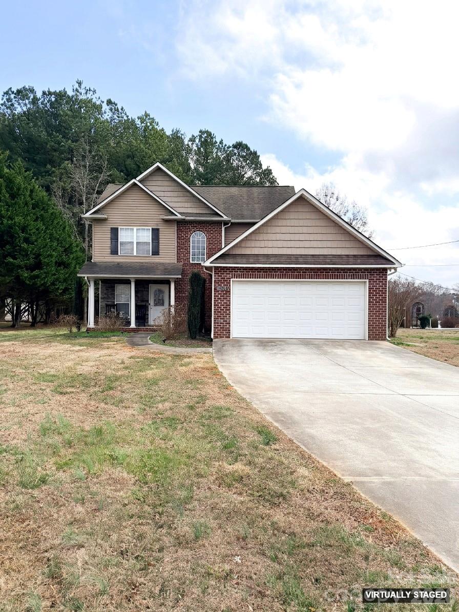 5876 St Peters Church Road Conover, NC 28613 - Photo 1 of 25 a front view of a house with a garden