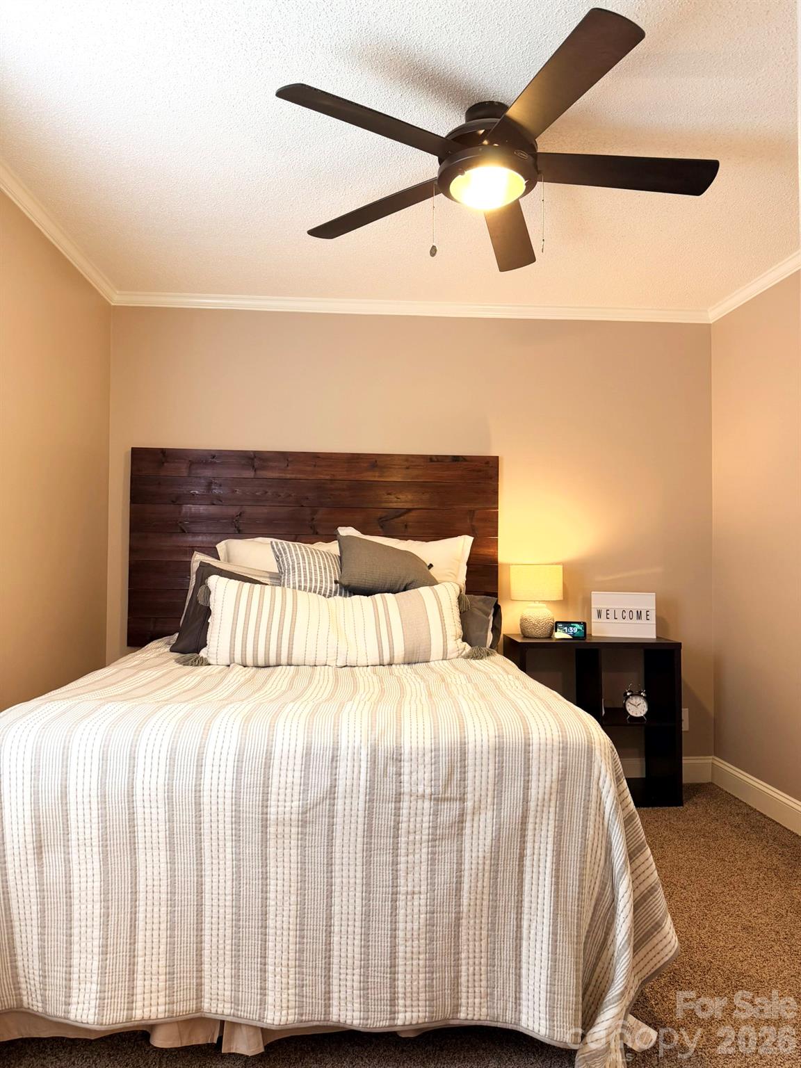 5876 St Peters Church Road Conover, NC 28613 - Photo 16 of 25 a bedroom with a bed and a night stand