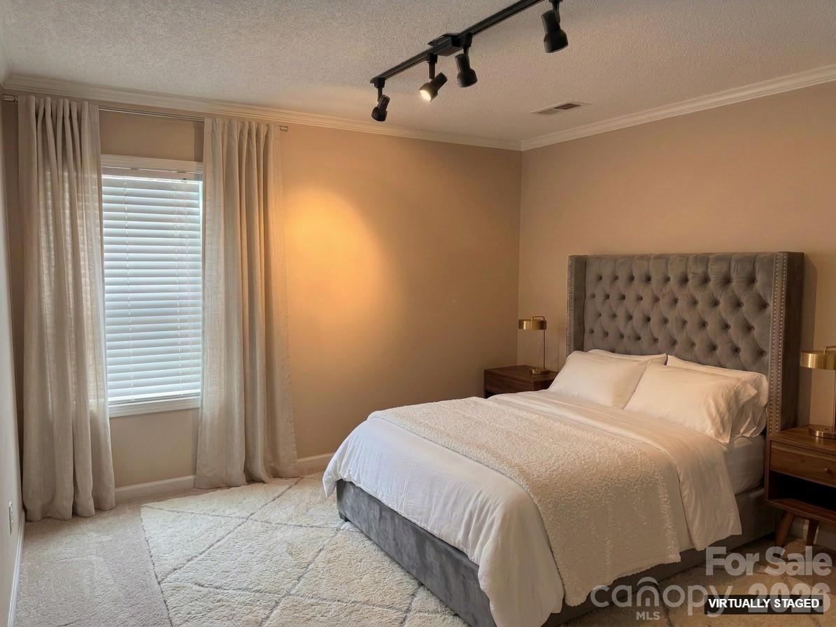 5876 St Peters Church Road Conover, NC 28613 - Photo 18 of 25 a bedroom with a bed and a window