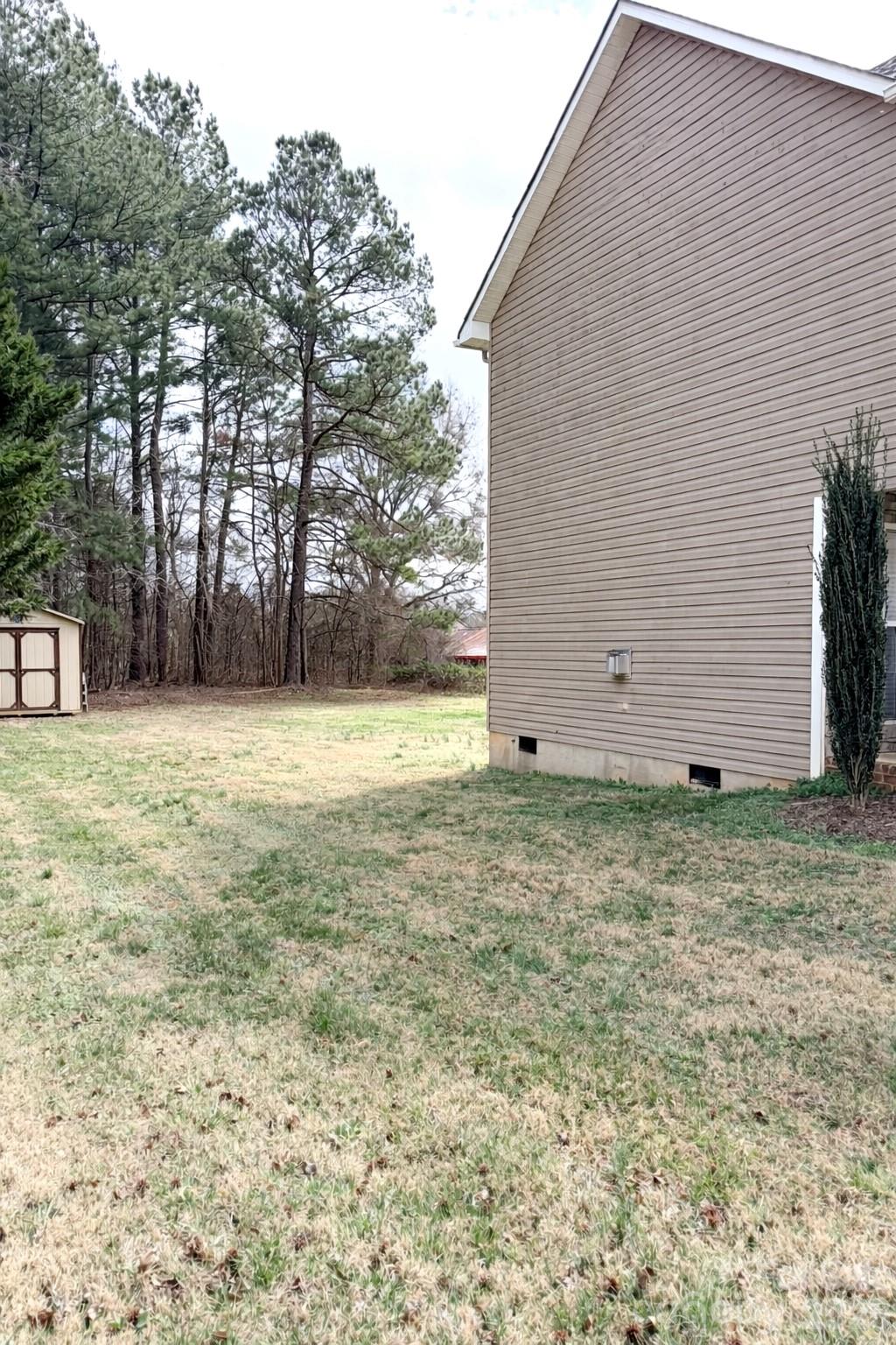 5876 St Peters Church Road Conover, NC 28613 - Photo 22 of 25 a view of a backyard with large trees