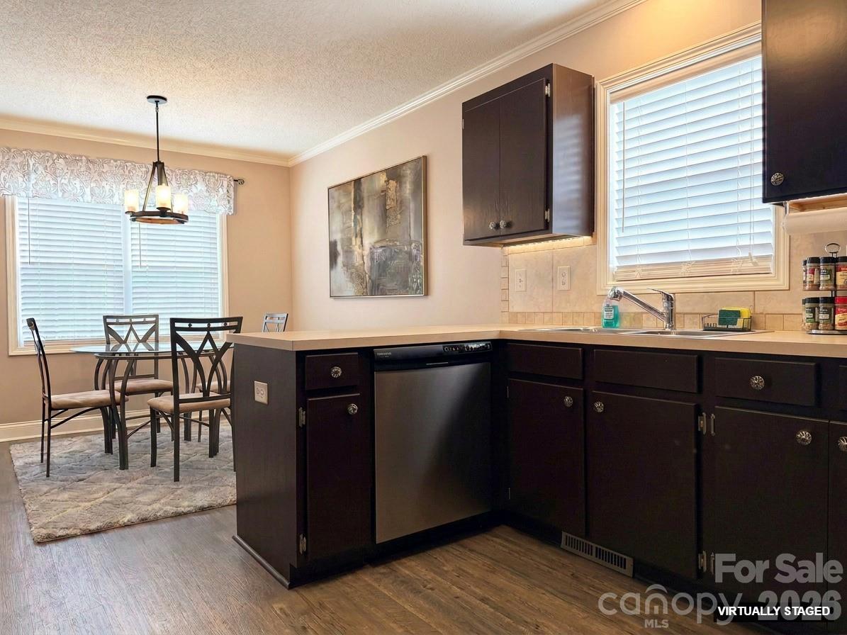 5876 St Peters Church Road Conover, NC 28613 - Photo 5 of 25 a kitchen with granite countertop a sink cabinets and wooden floor