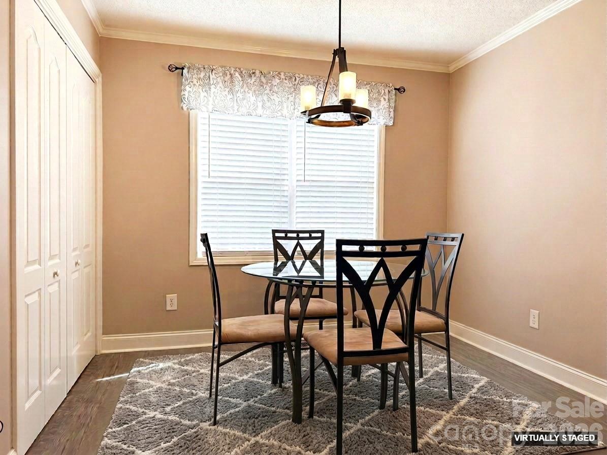 5876 St Peters Church Road Conover, NC 28613 - Photo 8 of 25 a view of a dining room with furniture and chandelier