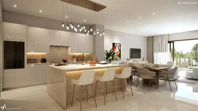 a dining room with furniture a kitchen and chandelier