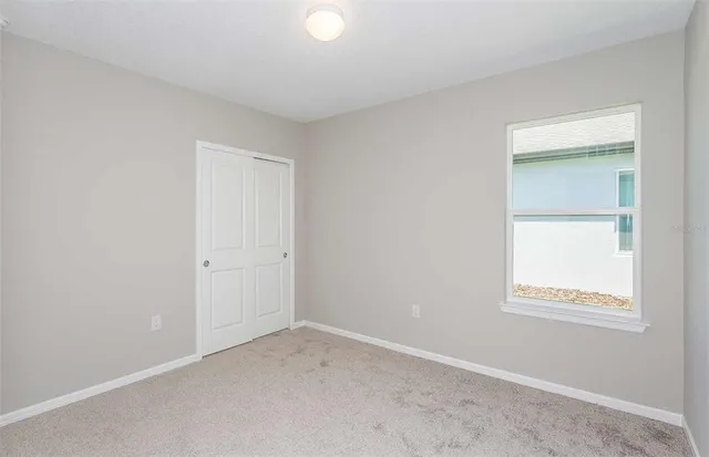 an empty room with a window