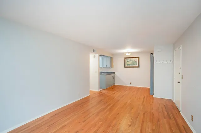 a view of a livingroom with wooden floor