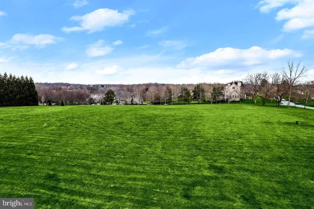 a view of a golf course with a garden