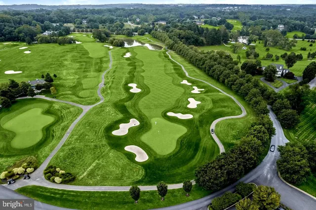 a view of a golf course with a garden