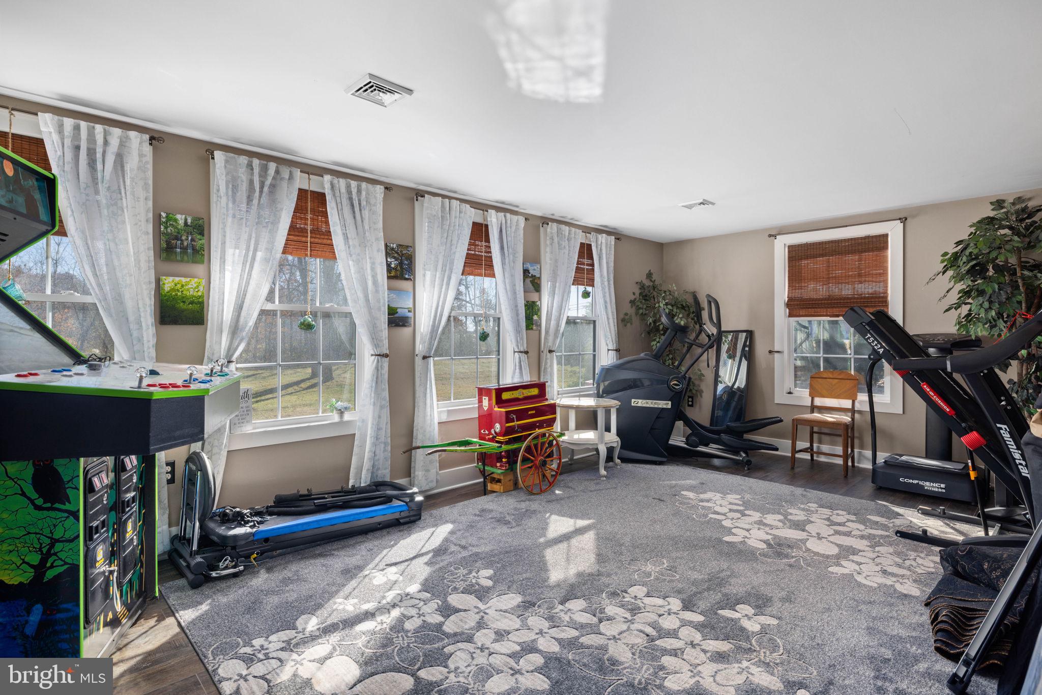 3204 Highway 72 Jonestown, PA 17038 - Photo 14 of 64 a living room with furniture a flat screen tv and a large window