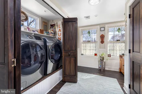 a utility room with dryer and washer