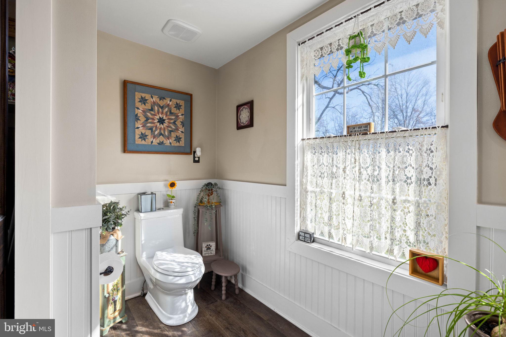 3204 Highway 72 Jonestown, PA 17038 - Photo 18 of 64 a white toilet sitting next to a bathroom next to a window
