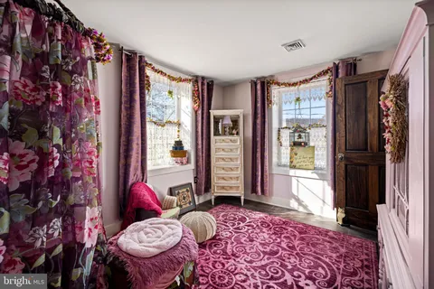 a view of a garage with cars