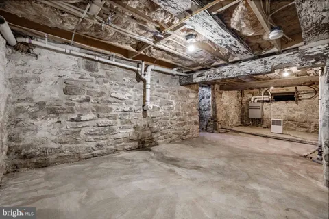 a view of an house with backyard and a ocean view