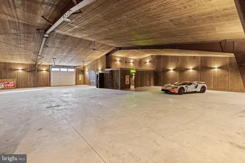 a view of yard and basketball court