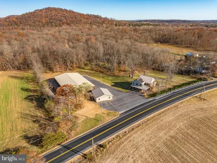 a view of a pool with a mountain