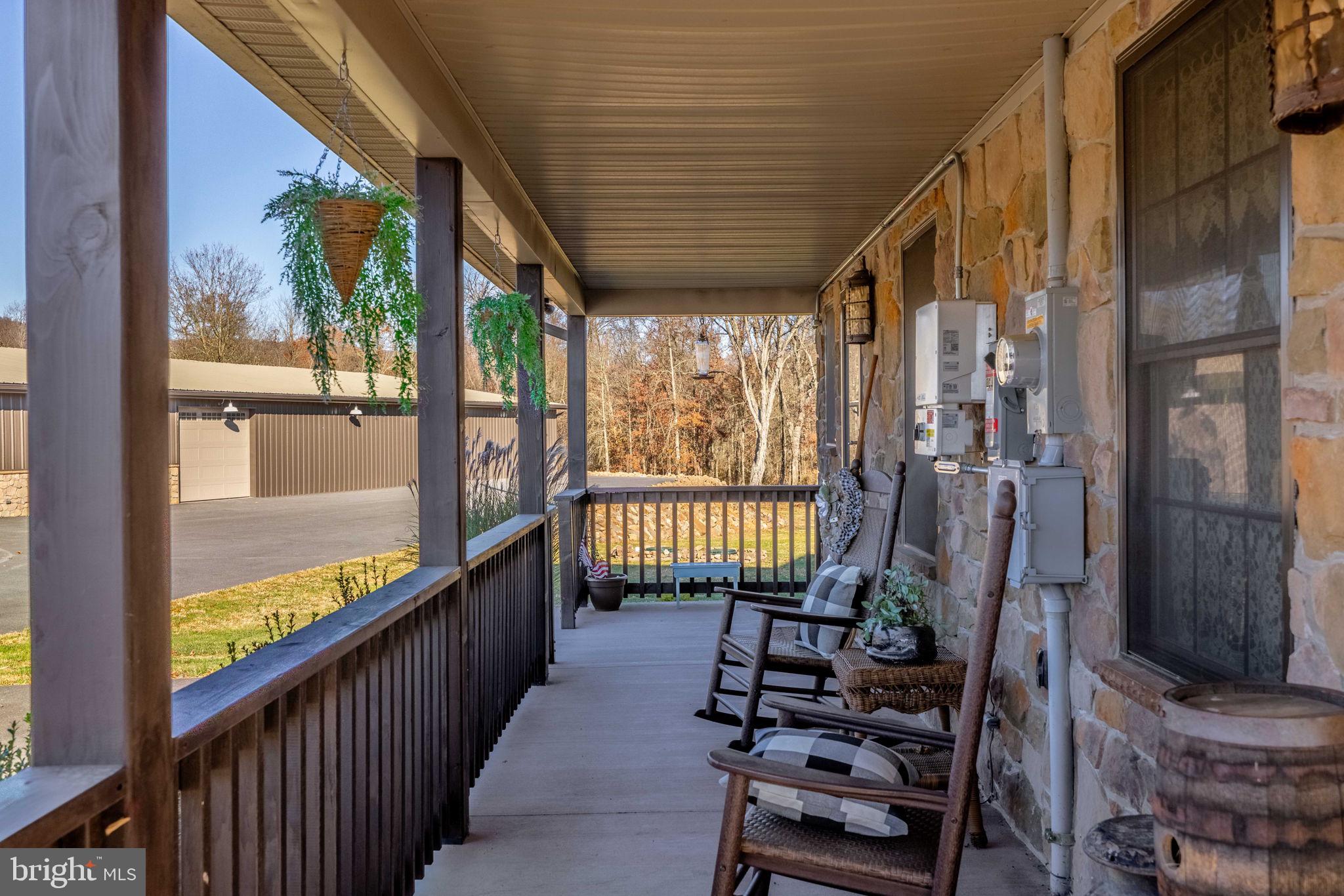 3204 Highway 72 Jonestown, PA 17038 - Photo 8 of 64 a view of a porch with wooden floor and outdoor seating
