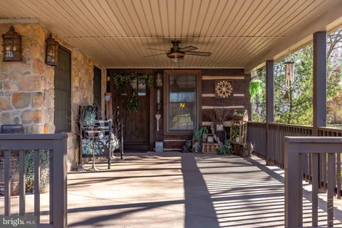 a view of a building with sitting area