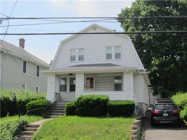 129 Frost Road Waterbury, CT 06705 - Photo 1 of 1 a house view with a garden space