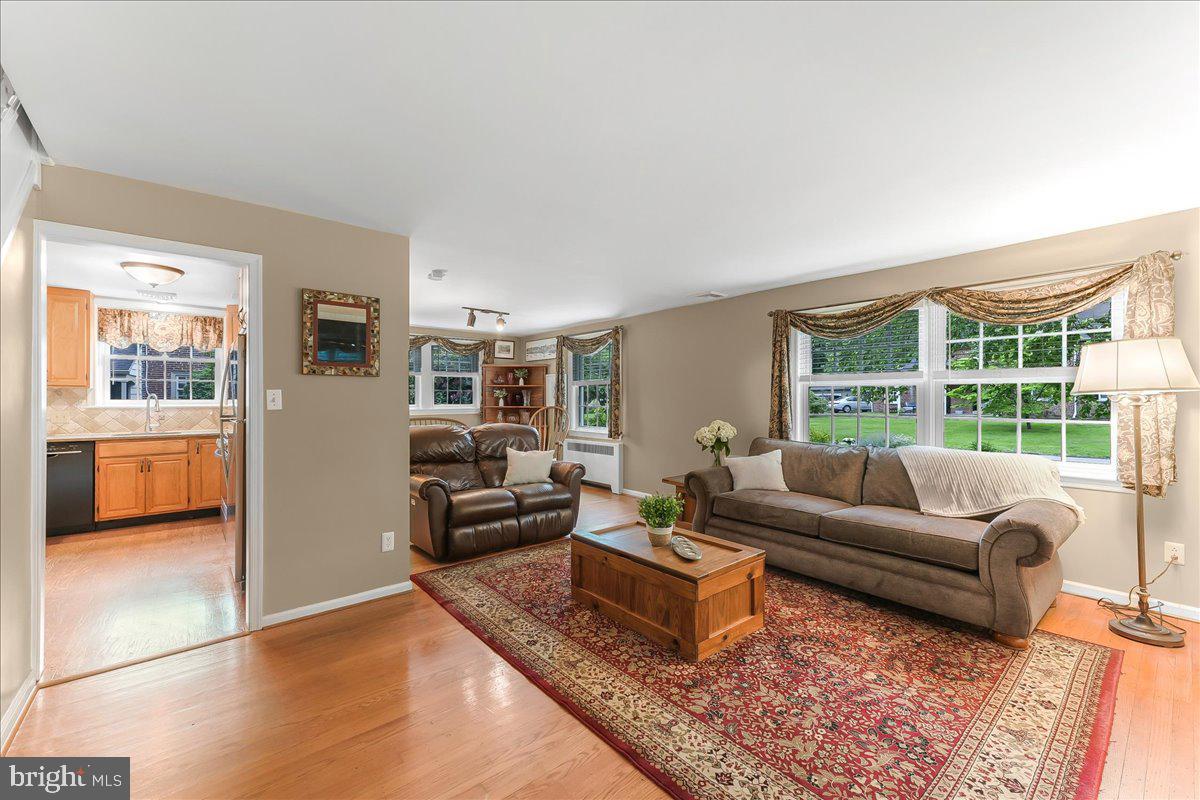 106 Barley Mill Road Wallingford, PA 19086 - Photo 8 of 50 a living room with furniture and a large window